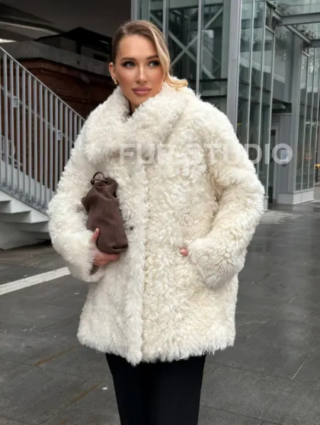 Белая шубка из тиградо - фото 12